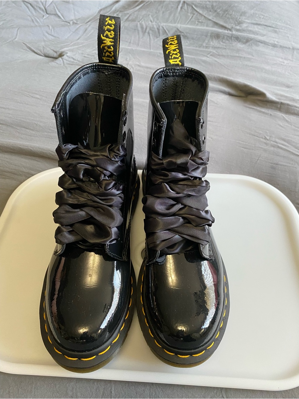 Dr. Martens Black Patent Leather Boots with Yellow Stitching